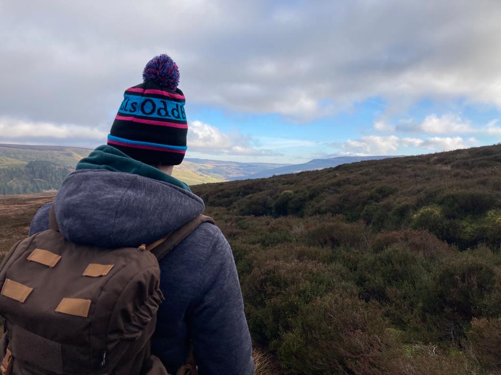 Image of me facing away from camera looking upon the Peak District